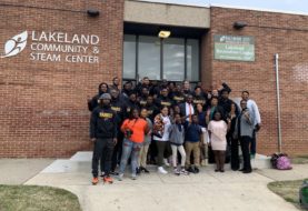 First Lady Sharon Robinson and Football Team Perform Community Service on  Road Trips